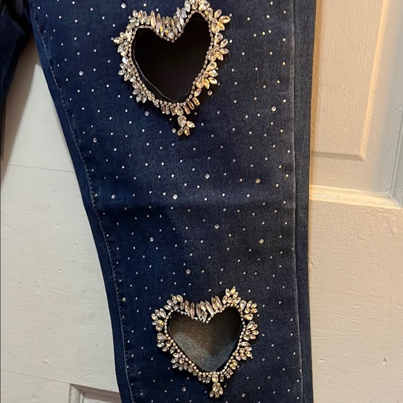Stylish Women's Blue Jeans with Heart Cutouts - Picture 3 of 9